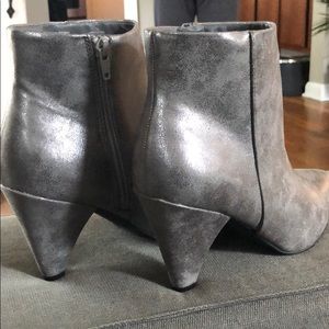 Metallic silver booties.